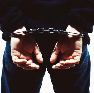 handcuffed-hands-kevin-curtis